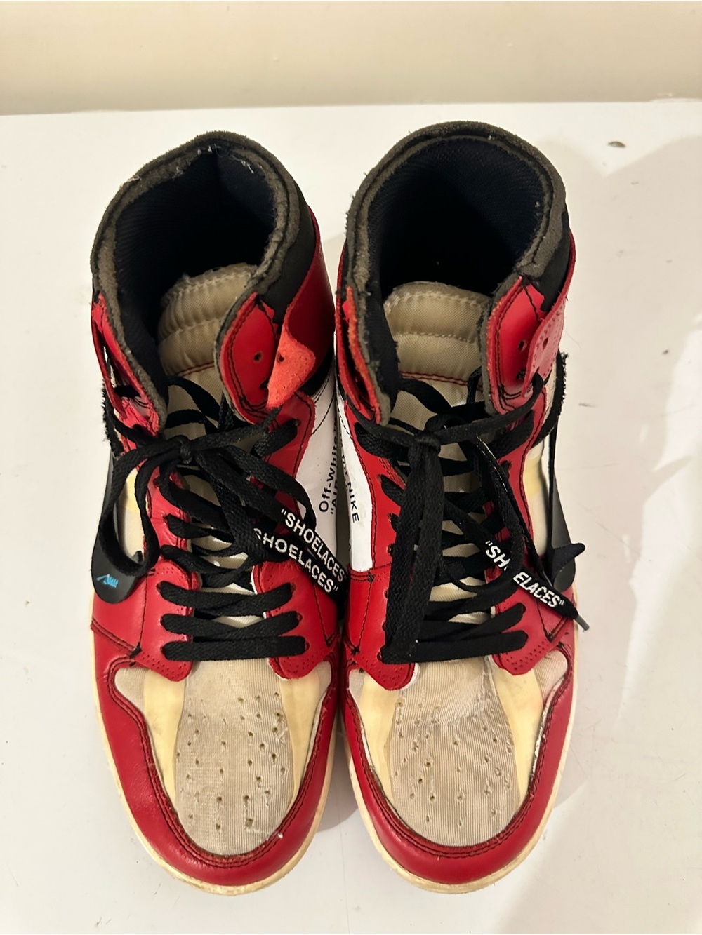 Red and White High-Top Sneakers with Black Laces